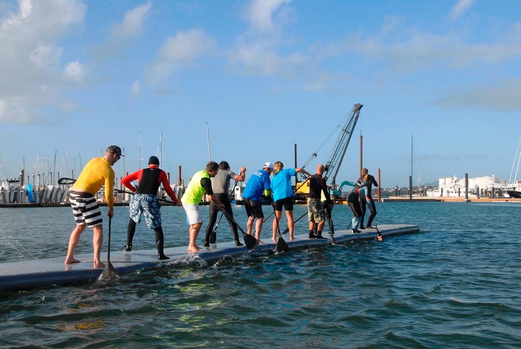 Troy Huston training the team to paddle a 20m SUP - Practice Session for Guinness World Record 'Most people on a SUP © Charles Winstone